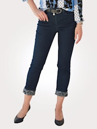 Jeans with a floral print hem