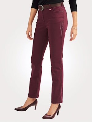 Trousers with decorative details