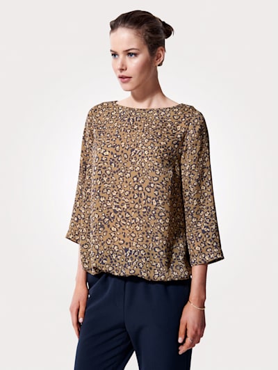 Pull-on blouse with an elegant print