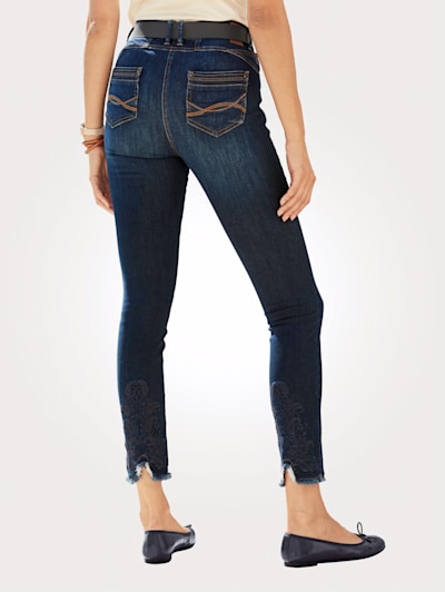 Jeans with fringe trim